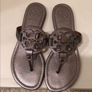 BRAND NEW Tory flip flops. Metallic silver